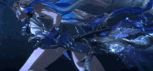a woman in a blue dress is holding a sword in her hand in a dark room .