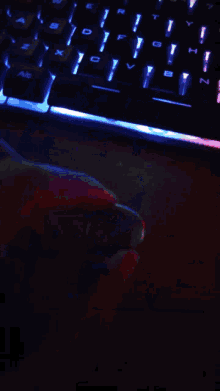 a blurry picture of a keyboard with a white screen