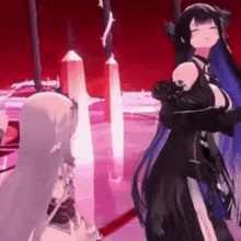 a couple of anime girls standing next to each other on a stage .
