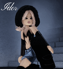 a doll with the name ador on the bottom