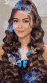 a woman with long curly hair is surrounded by butterflies