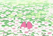 a pink rabbit with a flower on its head is standing in a field of flowers .