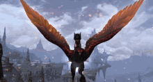a computer screen shows a bird with wings spread