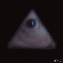 a close up of a person 's eye with the netflix logo on the bottom