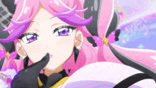 a girl with pink hair and purple eyes is wearing a black and yellow outfit