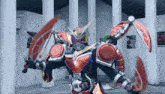 a man in a robot costume is holding two swords in his hands .