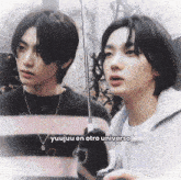 two young men are standing next to each other with the caption yuujuu en otro universo above them
