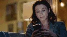 greys anatomy amelia shepherd on phone texting text