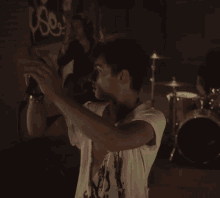 Band Singer GIF - Band Singer Ripped Clothes GIFs
