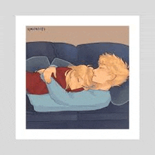 a man and a woman are laying on a couch hugging each other .