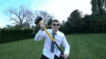 Playing With A Sledge Hammer Acting Silly GIF