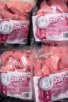 four bags of pink barbie pierogi are lined up