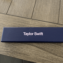 a blue box with taylor swift printed on it