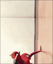 Deadpool Spiderman GIF - Deadpool Spiderman Climbing GIFs
