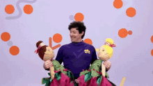 Holding Dolls Lachy Gillespie GIF - Holding Dolls Lachy Gillespie The Wiggles GIFs