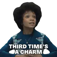 a woman says third time 's a charm on a sticker