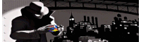 a man in a hat is holding a rubik 's cube in front of a city