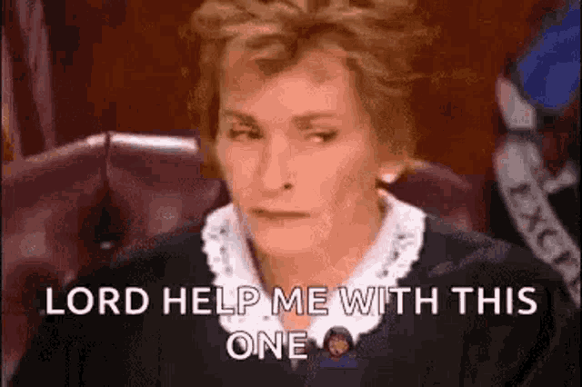 a judge is sitting in a courtroom with a serious look on her face .