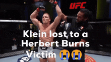 a man in a ufc shorts stands in a cage