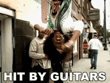 Hit By Guitars Ludacris GIF - Hit By Guitars Ludacris Southern Hospitality Song GIFs