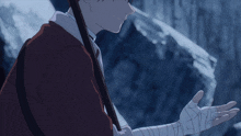 a man with a bandaged arm holds a stick
