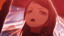 a close up of a girl 's face with her mouth open
