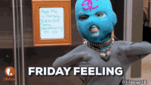 a person wearing a blue ski mask is standing in front of a sign that says " meet me in therapy "