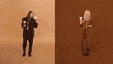 a man in a suit and tie is dancing next to a woman in a wig