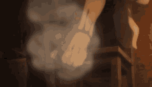 a close up of a person 's hand with smoke coming from it