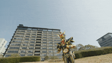 a man in a costume stands in front of a building