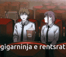 a man and a woman are sitting in a theater watching a movie and the words " sigarninja e rentsrat " are above them
