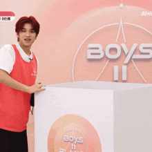two boys wearing red vests that say boar island