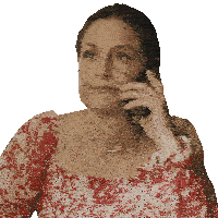 a woman wearing a red and white floral dress is talking on a cell phone