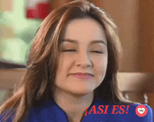 a woman with her eyes closed has the word asies written on the bottom of her face