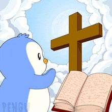 a penguin is standing in front of a cross and a bible