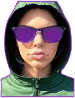 a woman wearing purple sunglasses and a green jacket with a zipper
