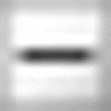 there is a shadow of a pen on a white background .