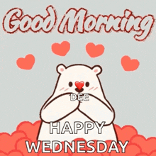 a polar bear holding a heart with the words good morning happy wednesday