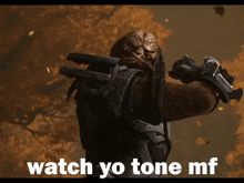 a picture of a predator with the words watch yo tone mf below him