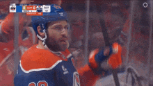a hockey player with the number 93 on their jersey