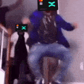 a man in a blue jacket is holding a mastercard card on his head
