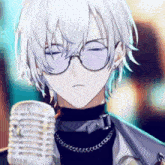 a boy with white hair and glasses holds a microphone