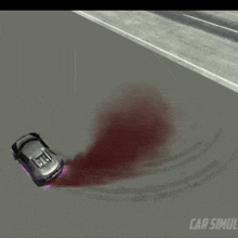 a car is driving down a road and smoke is coming out of it