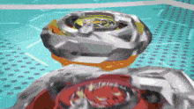 a pixelated image of a spinning top on a blue surface .