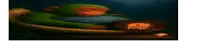 a blurry picture of a circle of fire with a hole in the middle .