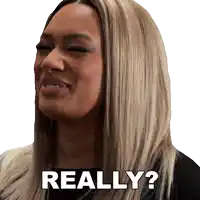 a woman with blonde hair is smiling with the words really written below her
