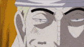 a close up of a man 's face with the words stop it