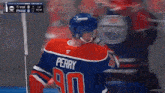 a hockey player wearing a jersey with the number 90 on it