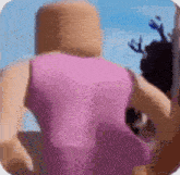 a cartoon character in a pink dress is walking in a field .