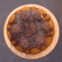 a pizza with chocolate sauce and cookies on top of it